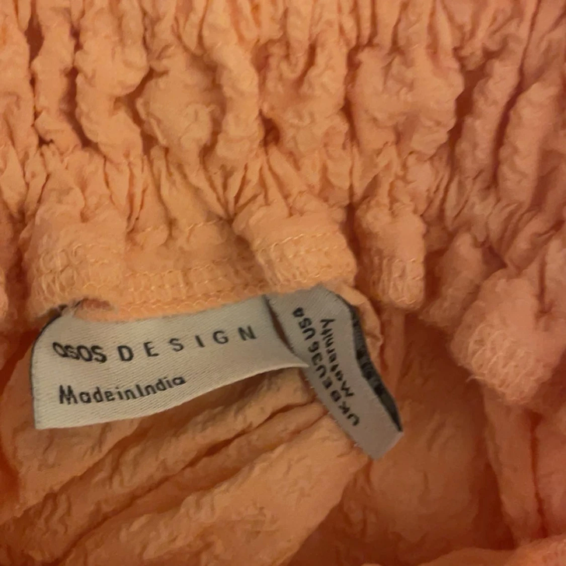 Ljusrosa ärmlös linnetopp med smock - 4