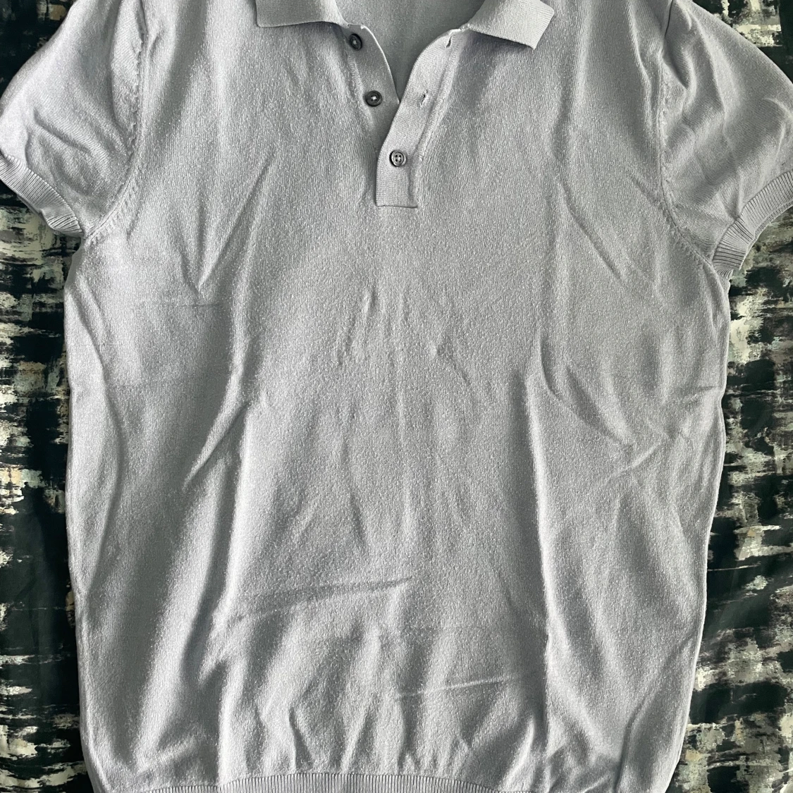 Ljusblå pikétröja från Zara