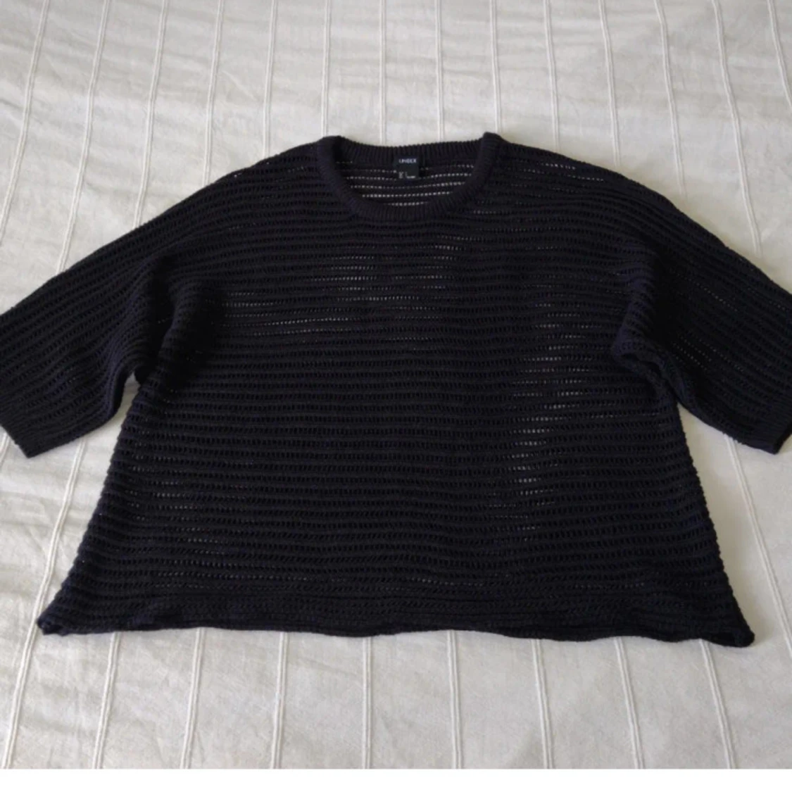 Svart stickad see through tröja från Lindex med korta ärmar