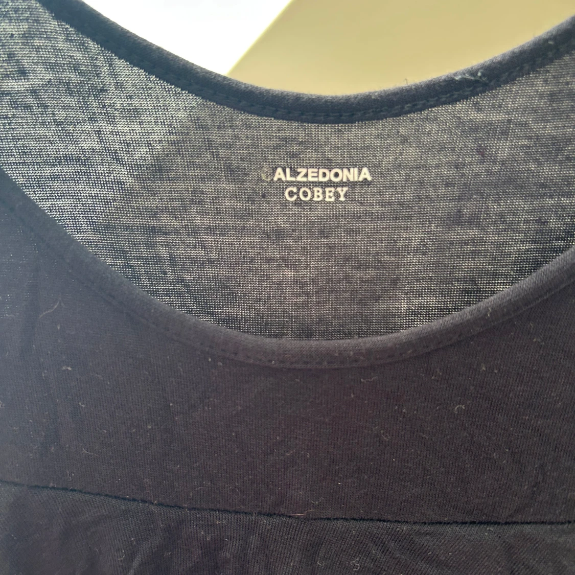 Svart klänning med volang från Calzedonia - 1