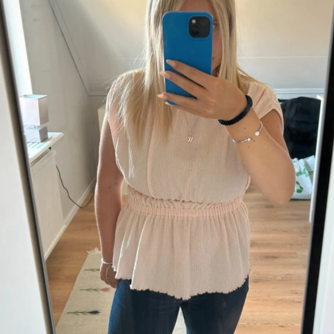 Ljusrosa blus med resår i midjan - 2