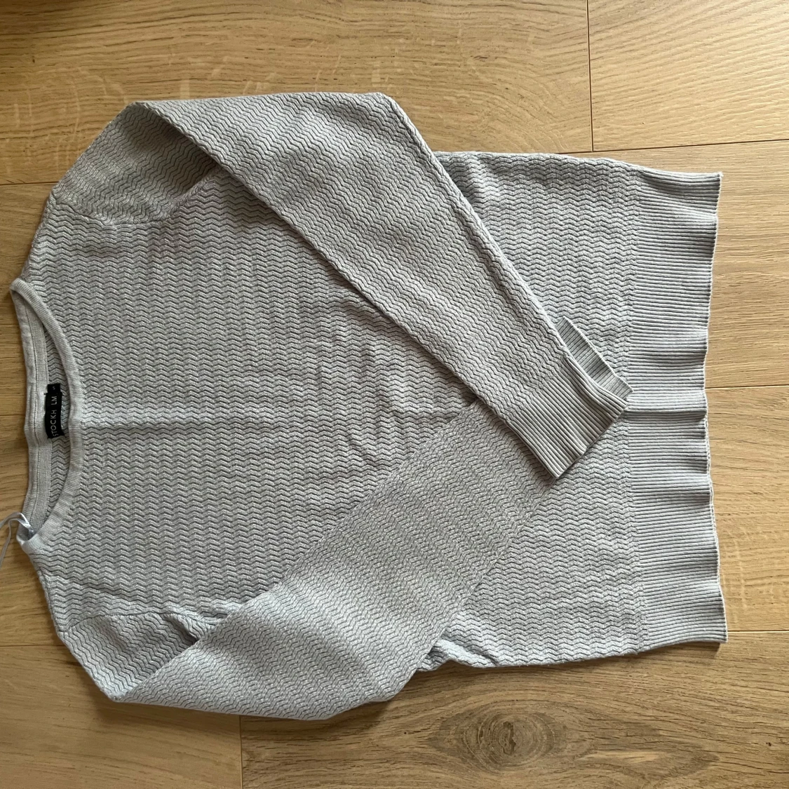 Ljusblå tröja från Stockh LM strl S - 1