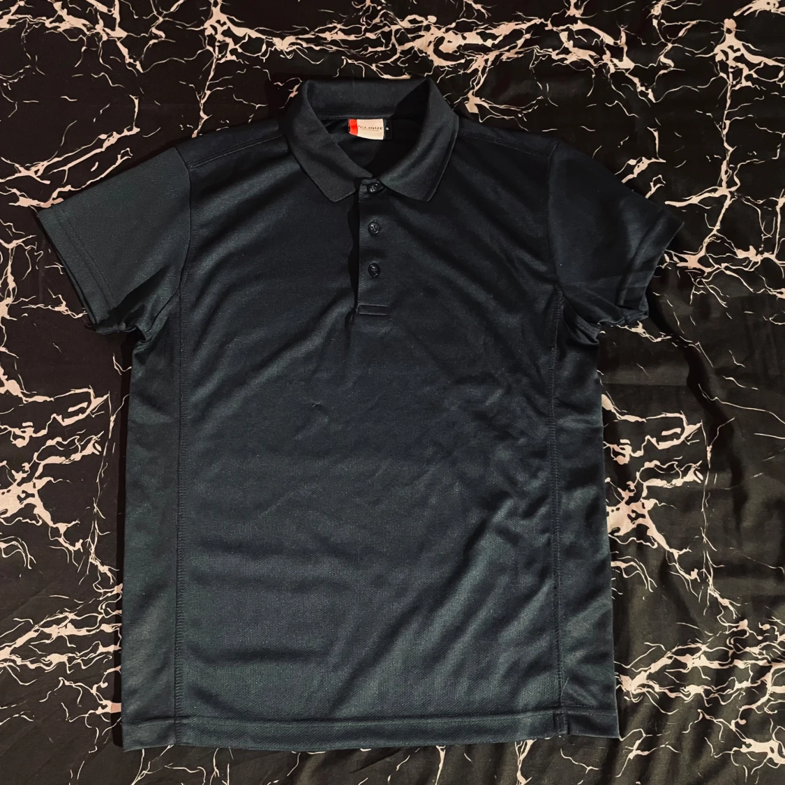 Marinblå pikétröja från Clique - 2