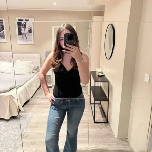 Svart body från Nelly  - Super fin body från Nelly i mycket bra skick! 