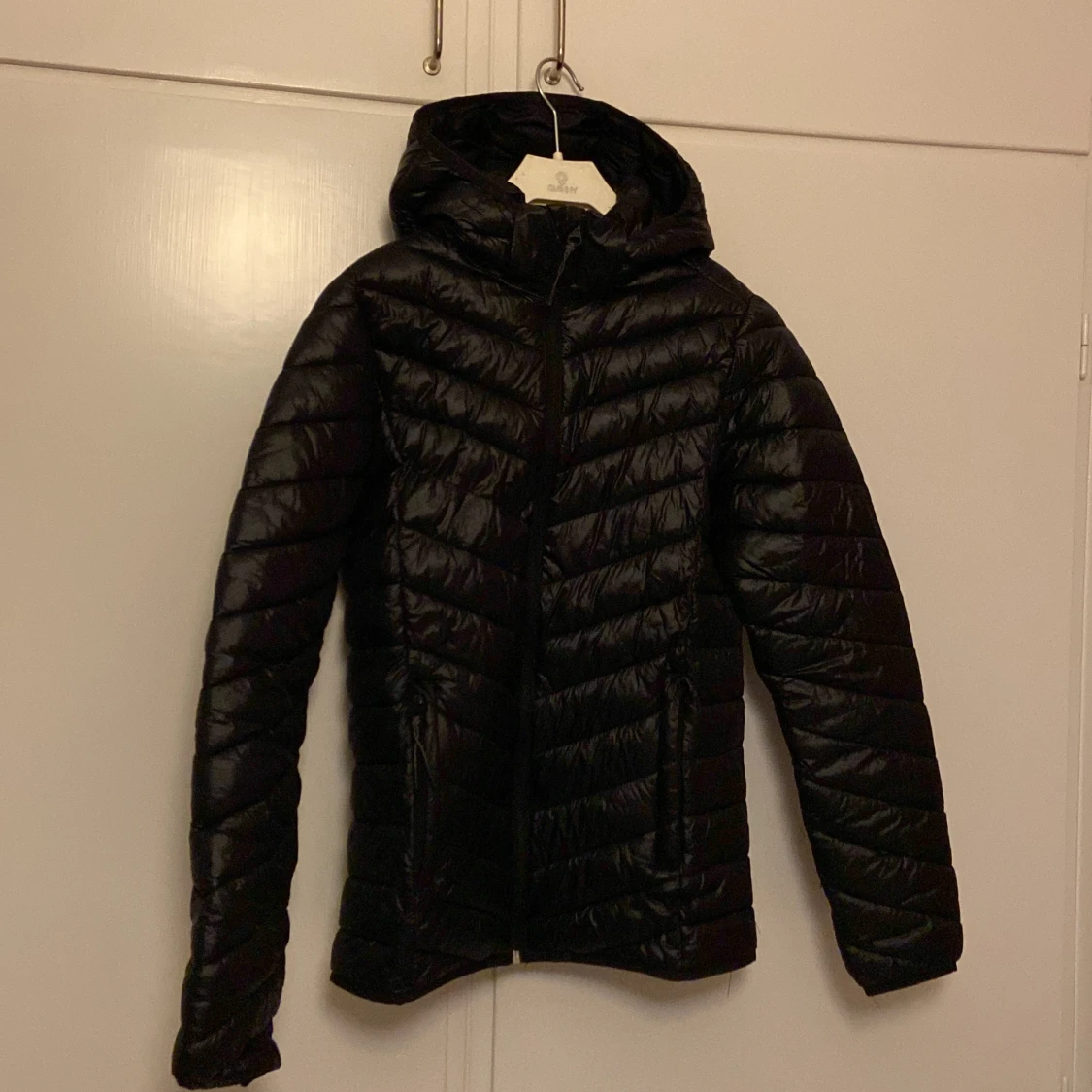 Svart dunjacka från McKinley