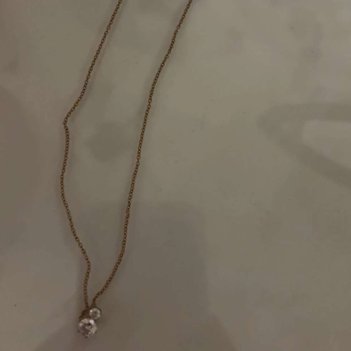 Guldhalsband med hänge