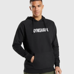 Svart Gymshark hoodie UNISEX - Helt NY och oanvänd svart hoodie från Gymshark med vit logga på bröstet. Perfekt för gymmet eller myskläder. Mjuk och skön bomullsmaterial  som håller dig varm under kyliga dagar. I storlek S hör av dig om du har frågor ✨💪🏼