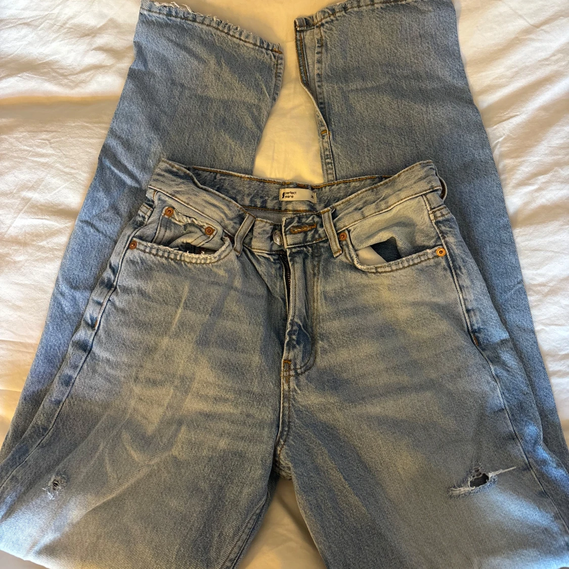 Ljusblå jeans från Gina tricot