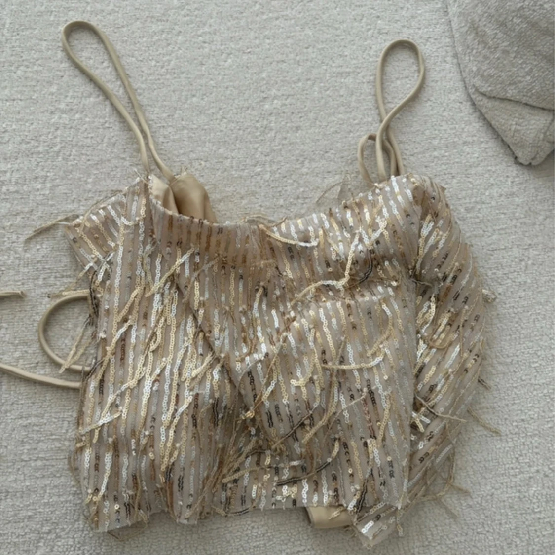 Glittrig guldig paljett-topp