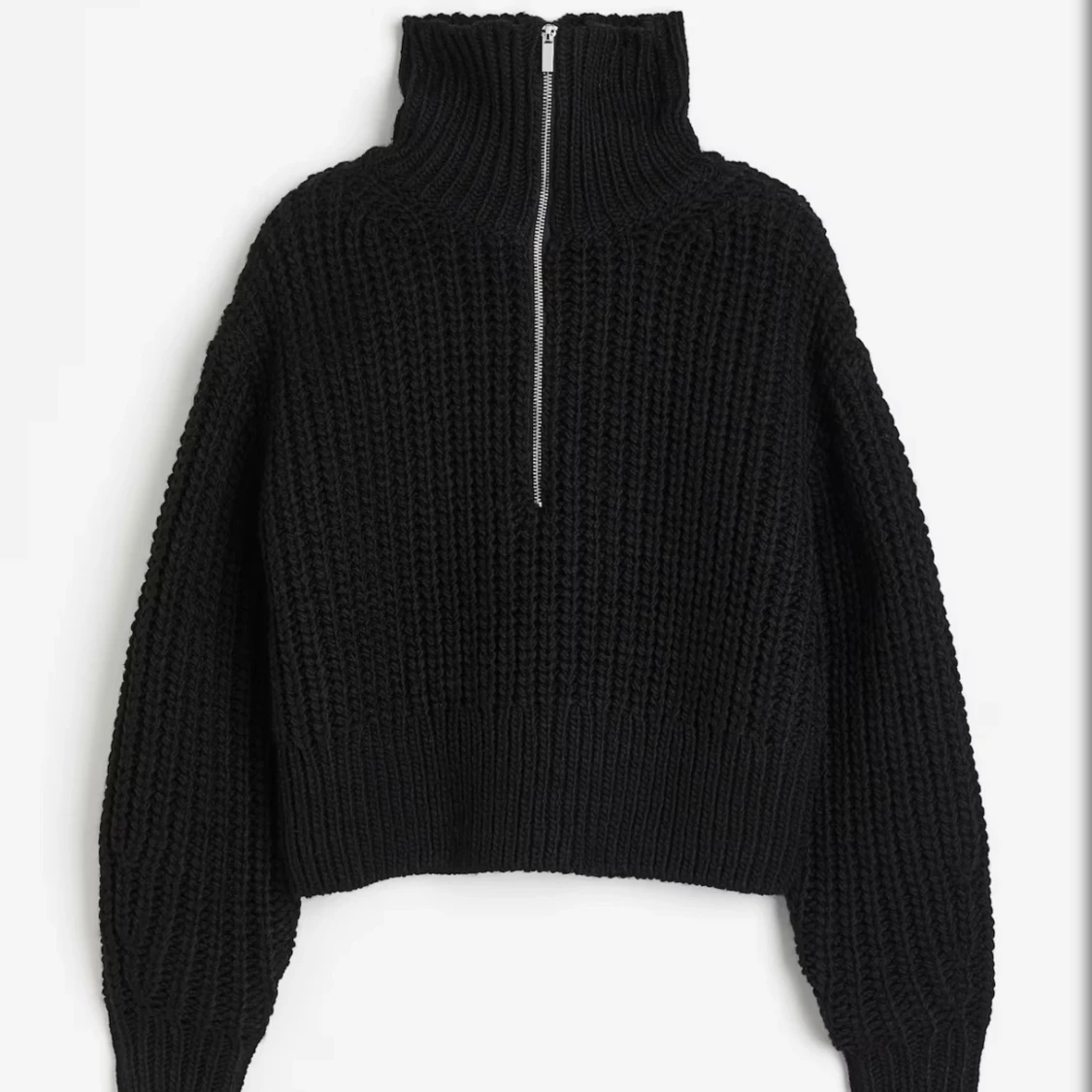 Svart stickad tröja med dragkedja från H&M