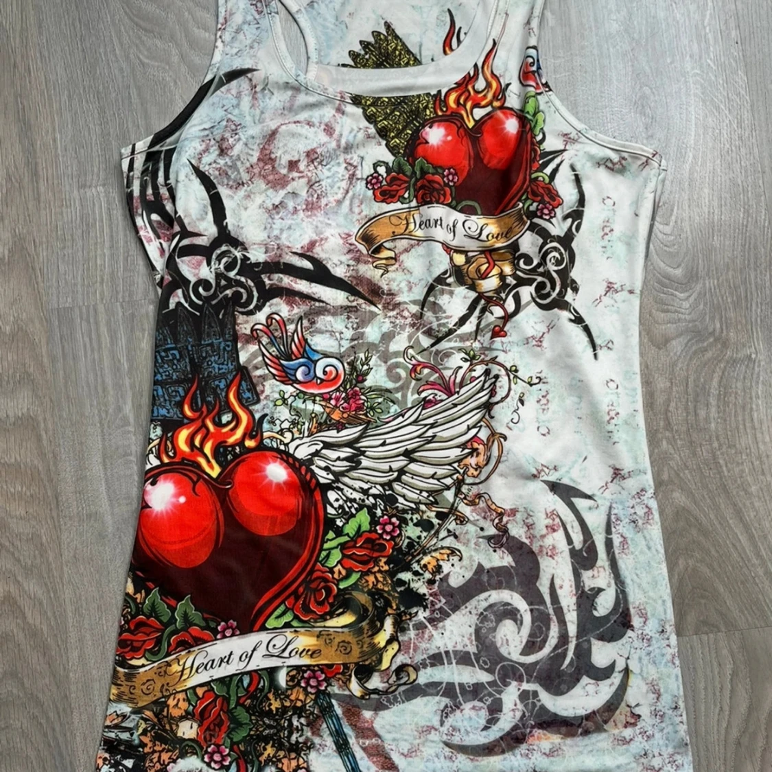 Tattoo-inspirerad linnetopp Club L