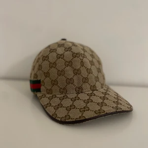 Gucci Keps - Helt ny och oanvänd, fick som present men har aldrig använt 