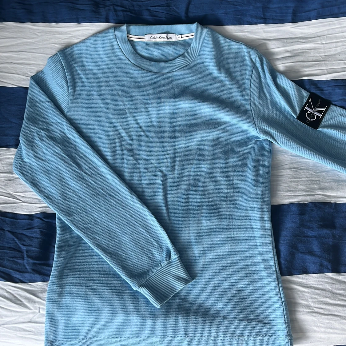 Ljusblå långärmad tröja Calvin Klein