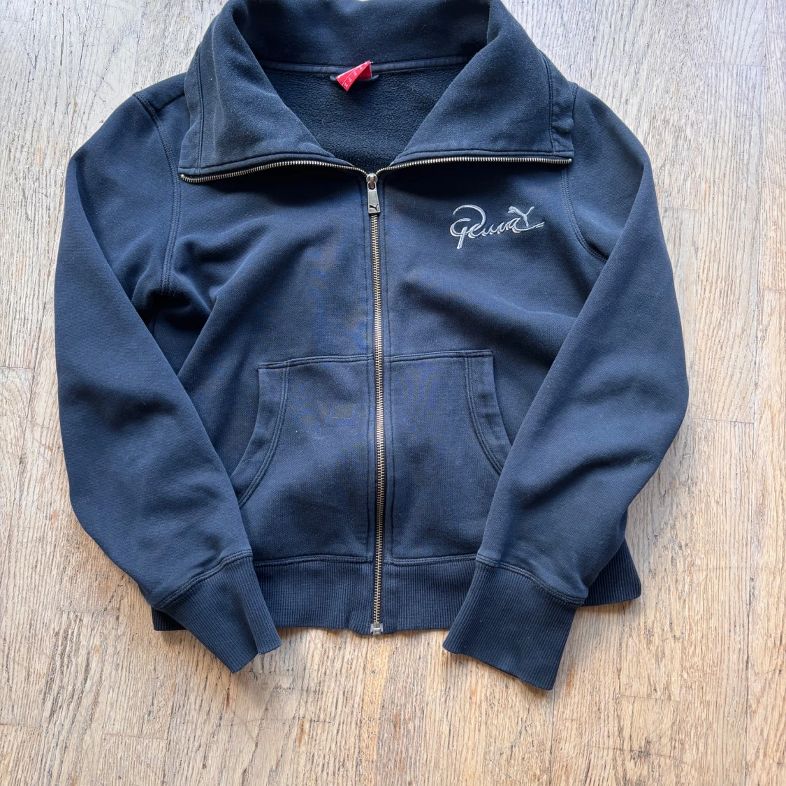 Svart zip hoodie från Puma XL
