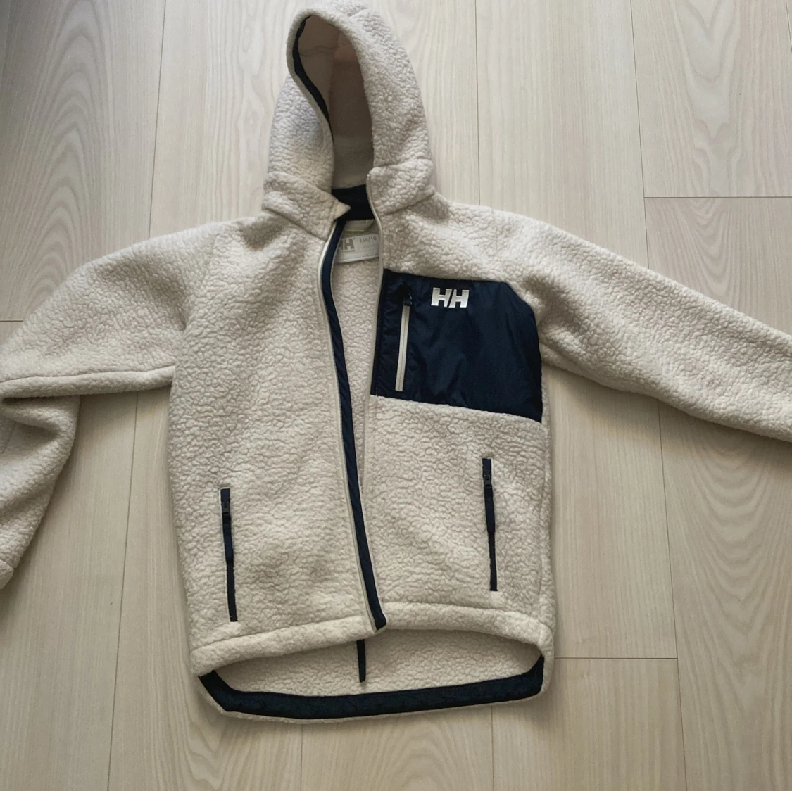 Beige teddyjacka Helly Hansen 140/10