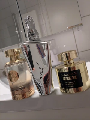 3 st Parfymer  - Lattafa Maahir Legacy 100ml Edp , Lattafa confidential private gold  100ml EDP, Paris Corner Mango Jugoso 100ml edp, annonspris avser 3 parfymer 