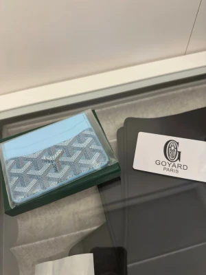 cyan wallet - perfect for the summer, price can be discussed 