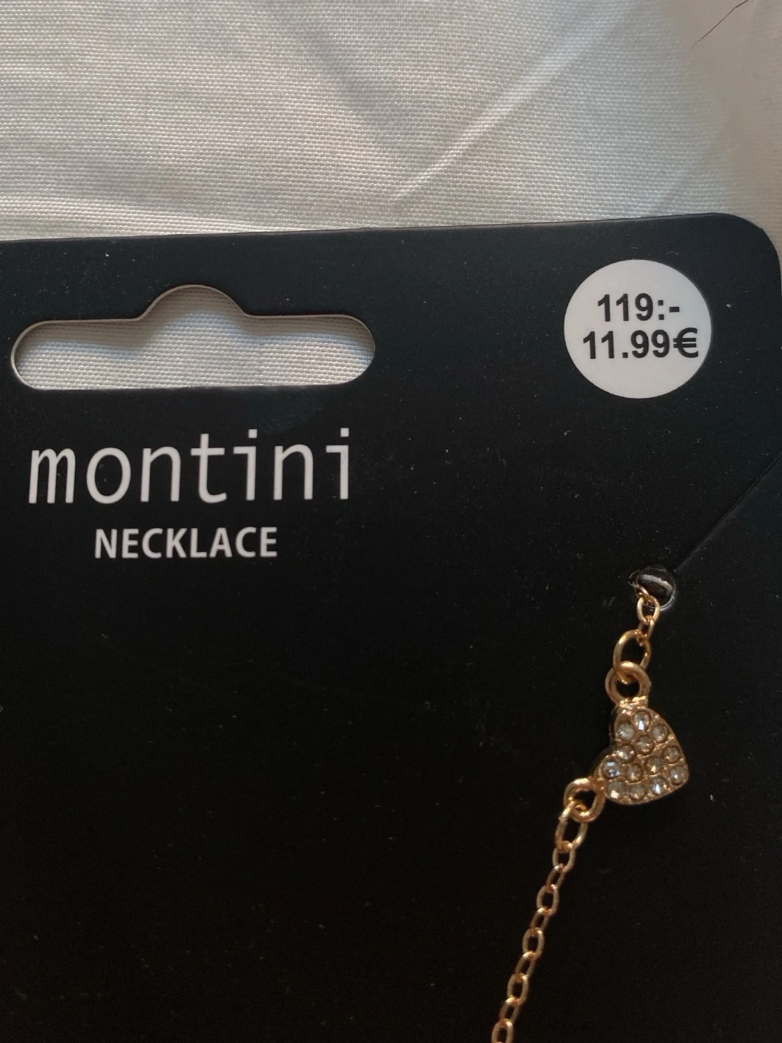 Guldfärgat halsband med hjärtan Montini - 1