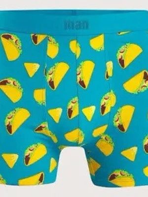 Blå kalsonger med taco-mönster - Säljer ett par blå kalsonger från Intimissimi med ett färgglatt taco- och nacho-mönster. Kalsongerna har en tight passform och är tillverkade i mjukt och stretchigt material som är bekvämt att bära. Perfekt för dig som gillar roliga prints.