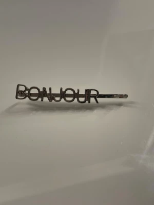 Hårspånne - Ett hårspänne i silver 