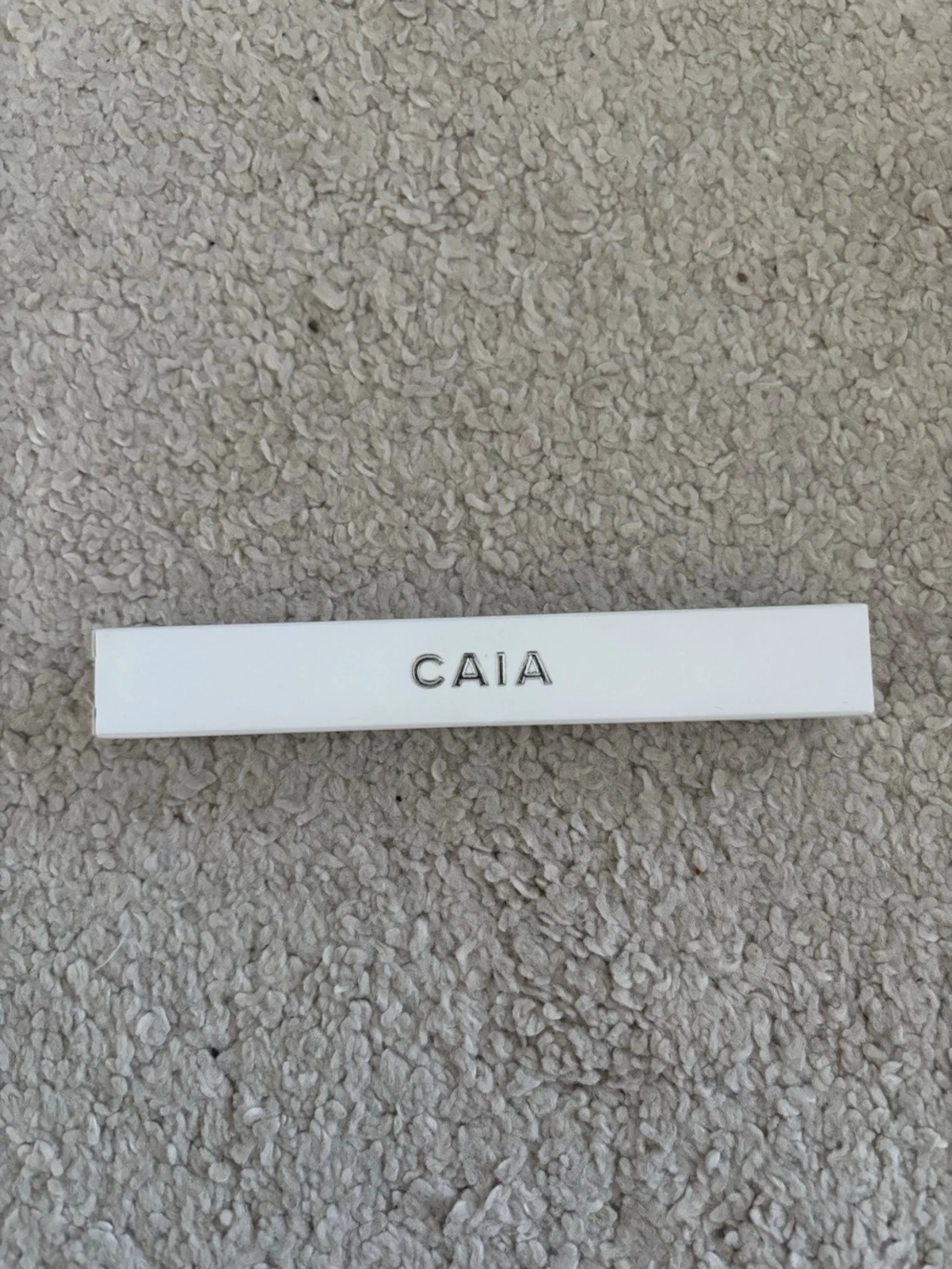 Oöppnad CAIA Faux Real mascara