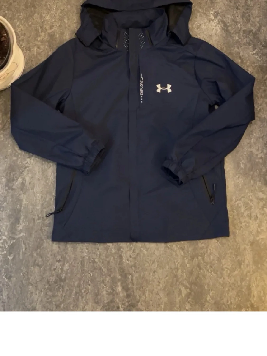 Blå vindjacka från Under Armour