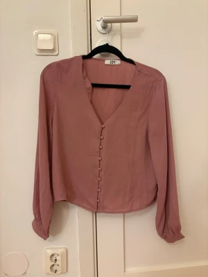 Rosa blus  - Fin blus knappt använd 