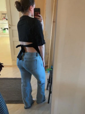 T-shirt  - Säljer denna fina fest topp från Nelly. Aldrig använd. 