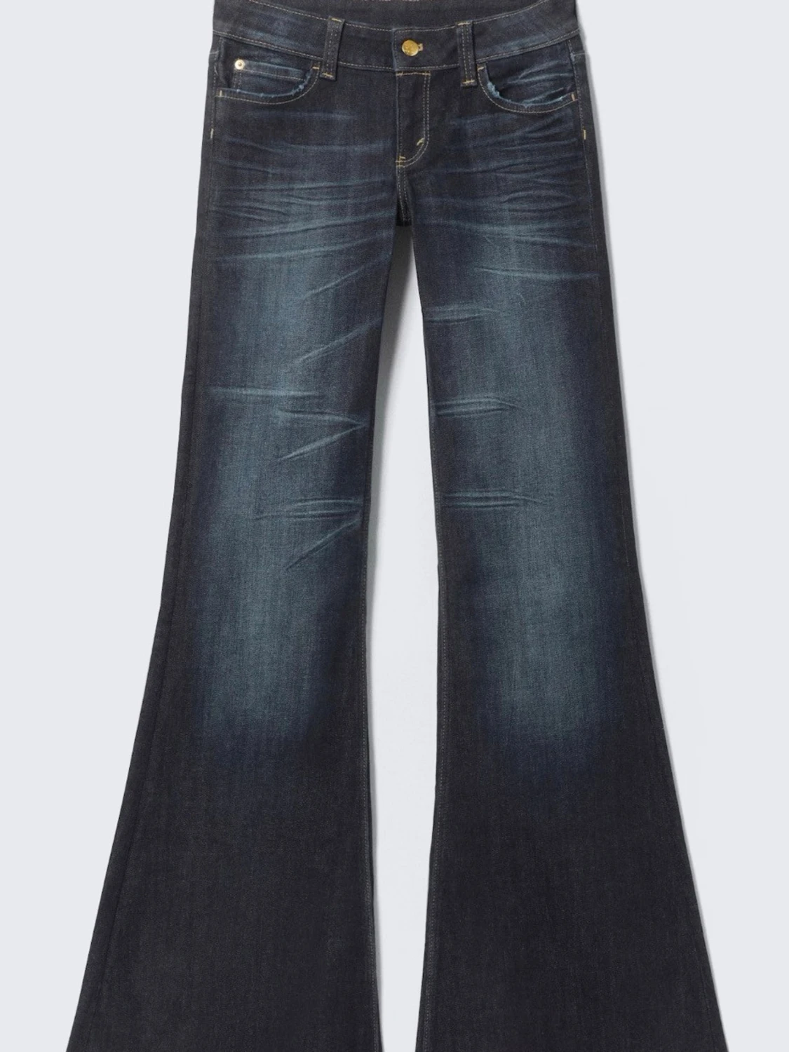 Mörkblå bootcut jeans med slitningar