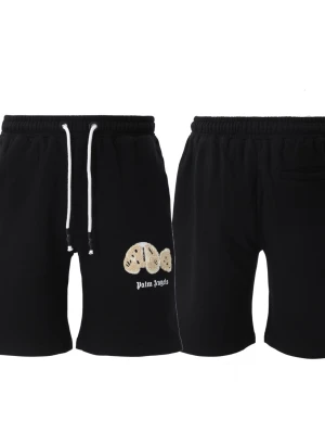 Svarta shorts från Palm Angels - Svarta shorts från Palm Angels med broderad nallebjörn-detalj på ena benet och vit snörning i midjan. Shorts i avslappnad passform med elastisk midja och bakficka. Perfekta för en cool och avslappnad stil.