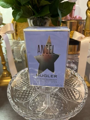 Mugler Angel Fantasm EdP 25ml - Angel Fantasm från Mugler är en Eau de Parfum. Flaskan rymmer 25 ml. HELT NY. 
