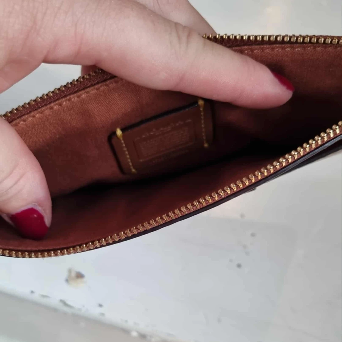 Brun plånbok från Coach i skinn - 1