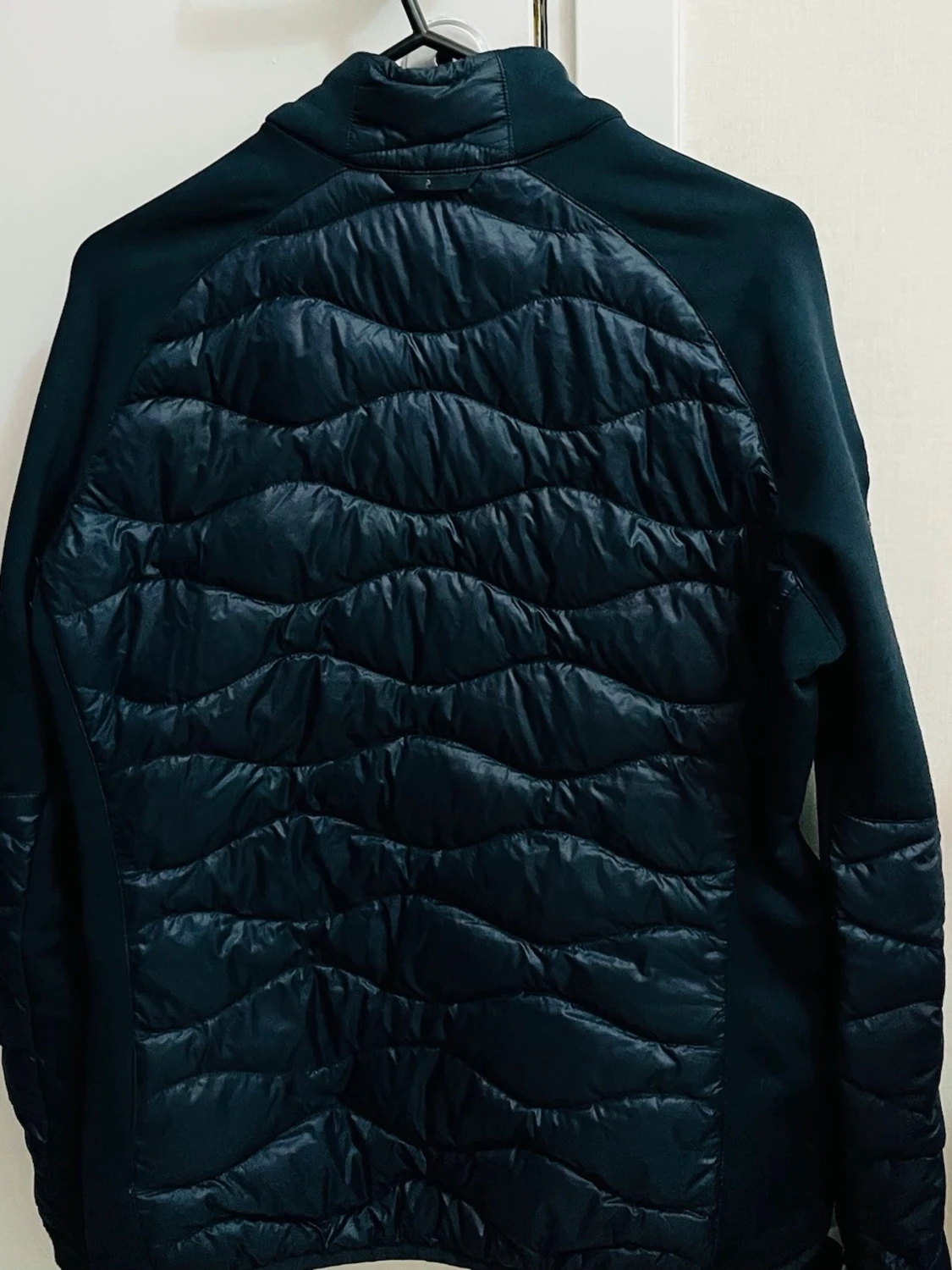 Mörkblå pufferjacka Peak Performance - 1