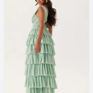 Balklänning turkos - Supersnygga och populära balklänningen från Bubbleroom i ljusgrön/turkos. Köpt för 1800kr. Storlek 38. Ny med prislapparna kvar