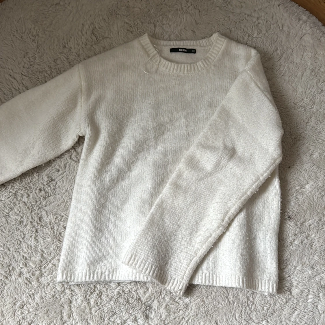 Vit stickad tröja