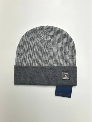 Lv Mössa - Helt ny aldrig använd. Storlek One size. Snabb frakt.