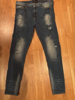 Supply & Demand blå skinny jeans XXL - Blå jeans från Supply & Demand i storlek XXL men liten i storlek passar även L och XL .