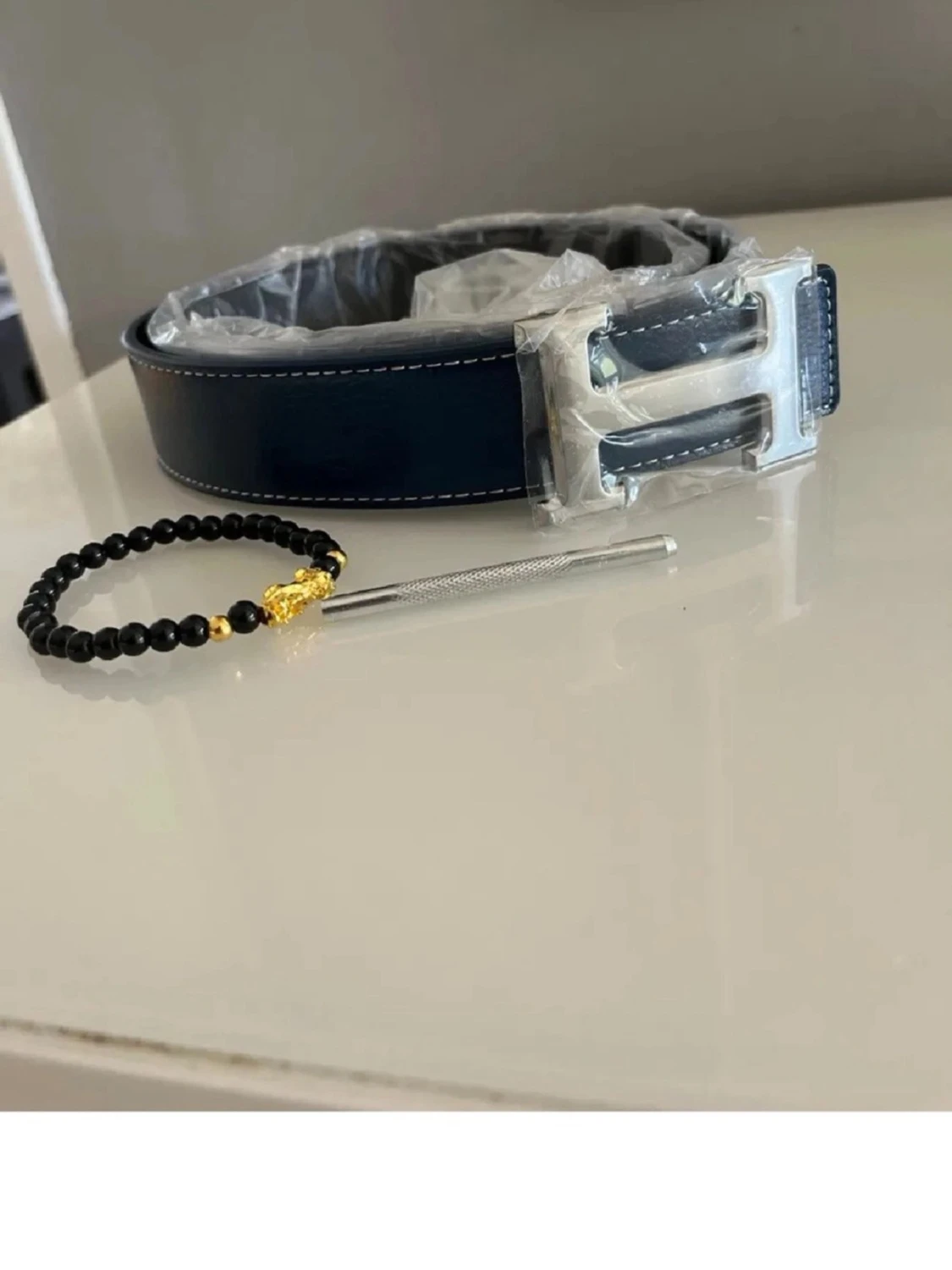 Mörkblått H bälte