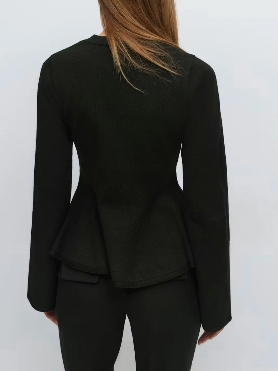 Svart peplum topp från gina tricot