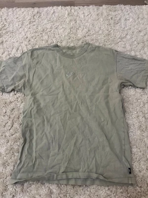 T-shirt  - Ljusgrön Nike t-shirt. Använd, men i fint skick! Skriv om frågor.