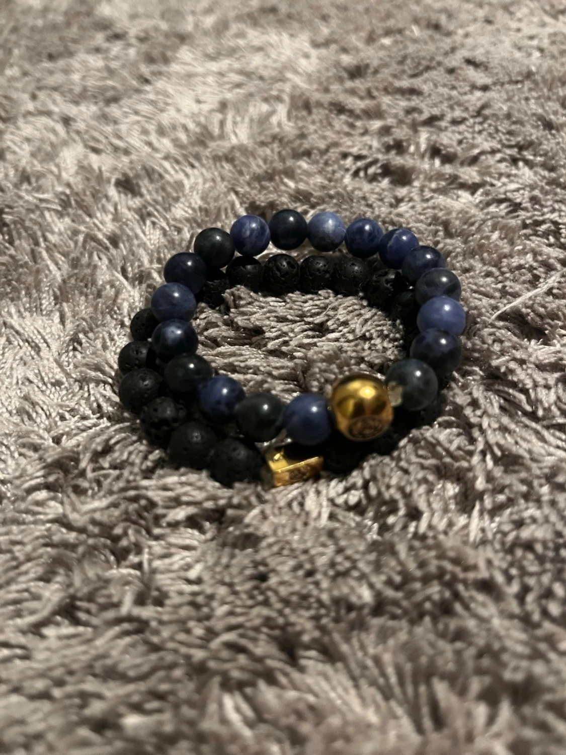 Blått och svart armband