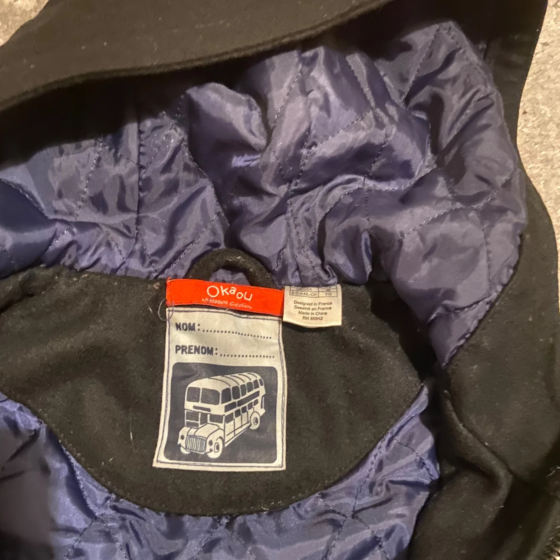 Svart Barn duffeljacka från Okaou  - 2