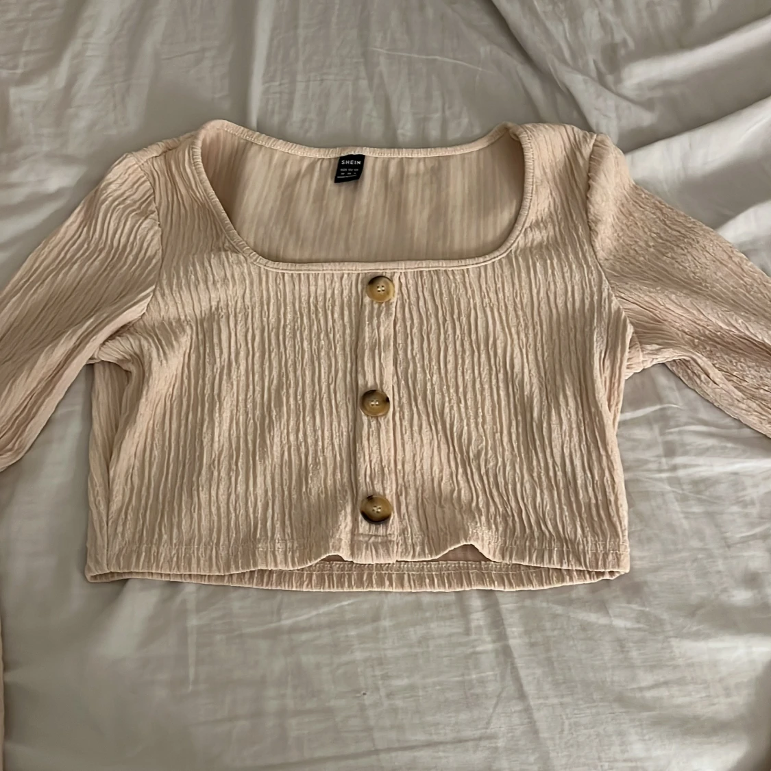 långärmad tröja me knappar