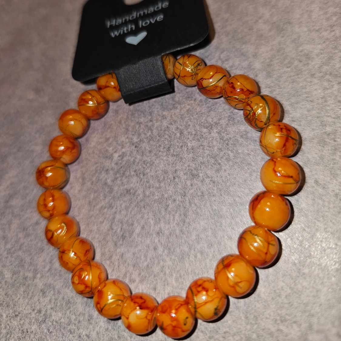 Handgjort orange pärlarmband - 1