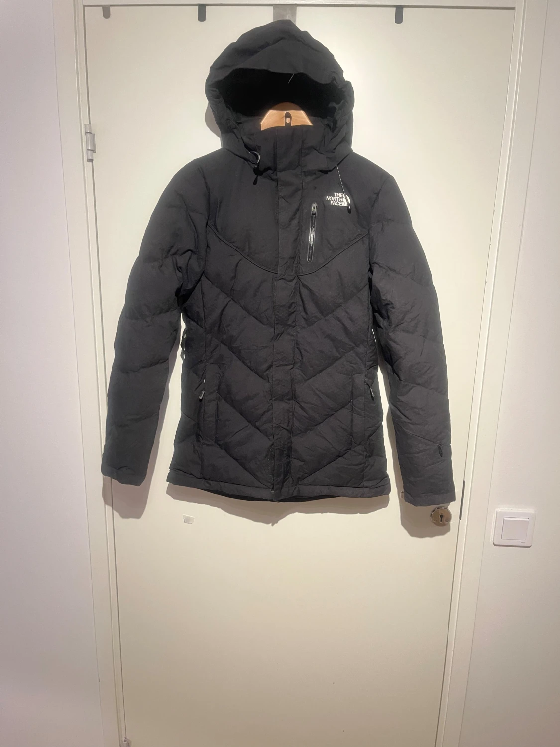 Fullrustad dunjacka från The North Face