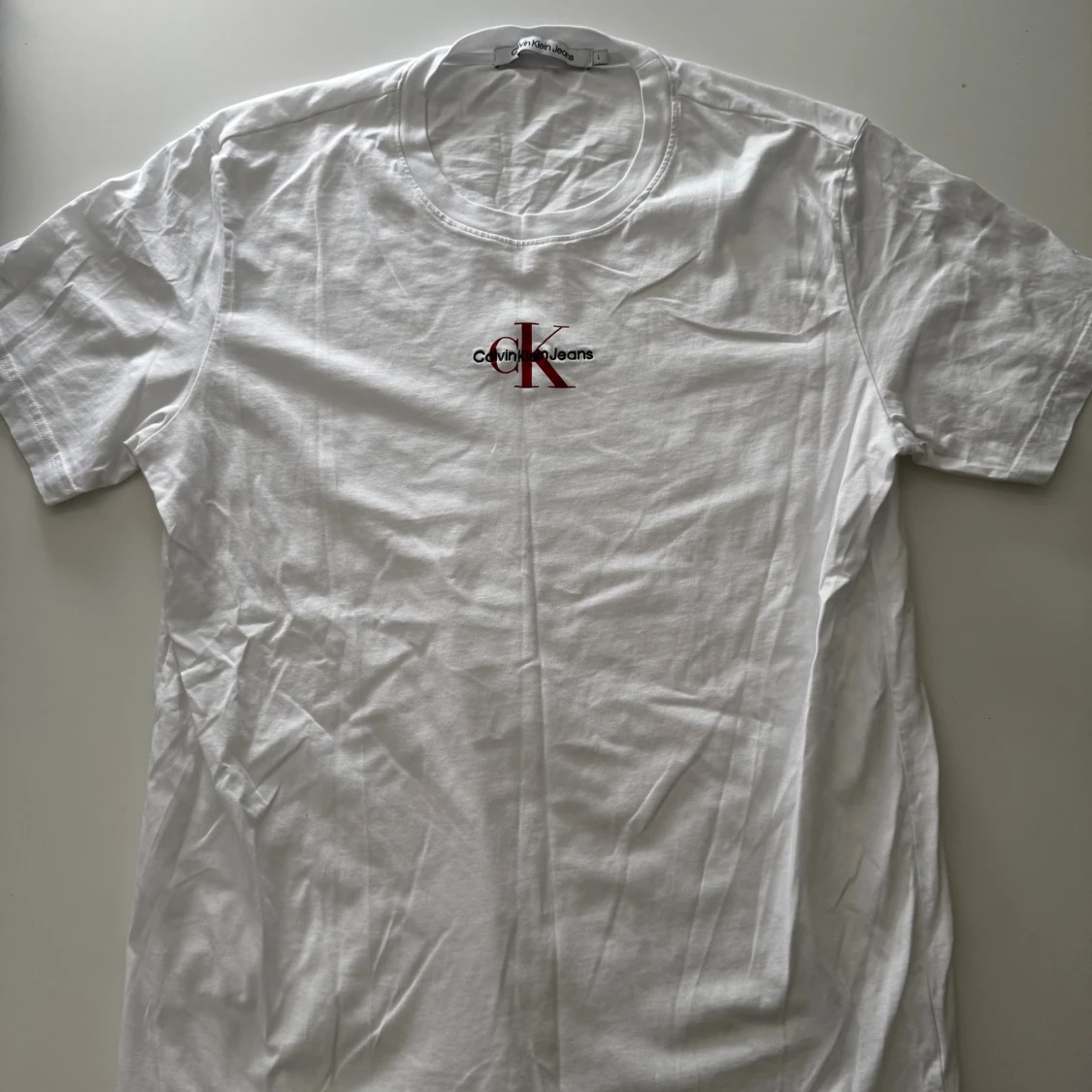 Vit Calvin Klein Jeans t-shirt L