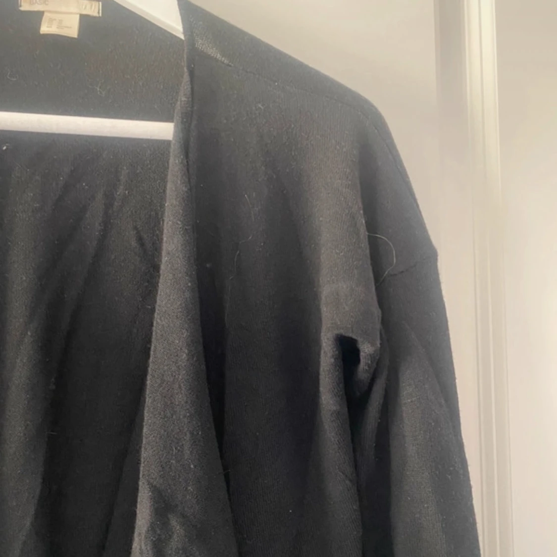 Svart kofta med öppen front - 1