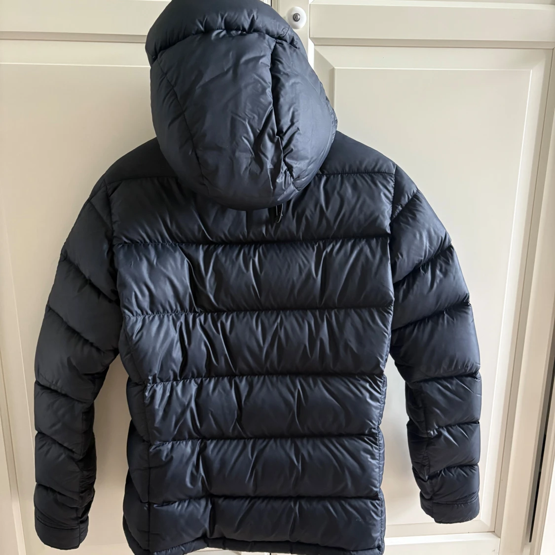 Svart dunjacka Peak Performance XS - 1