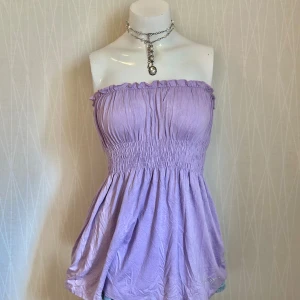 Ljuslila babydoll top med smock - Ljuslila babydoll top med smock