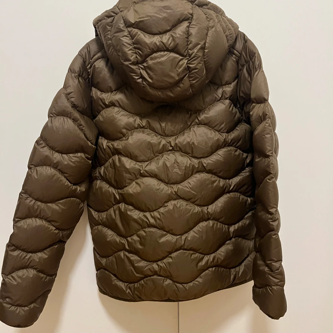 Brun dunjacka från Peak Performance - 1